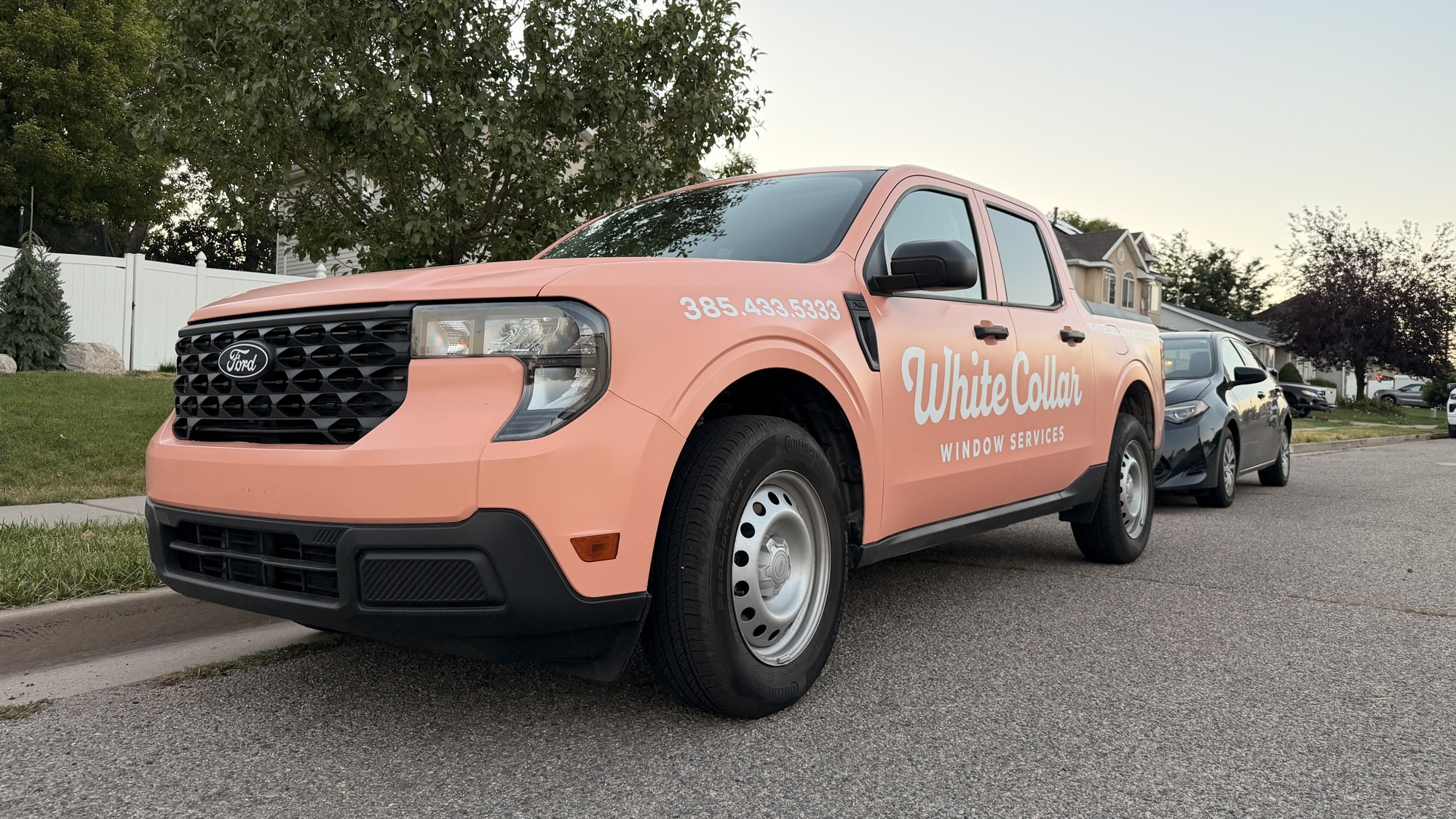 The peach White Collar Windows service truck